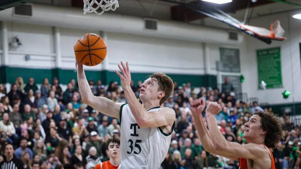 Luke Asplund drives to the basket as Mason Degnan defends. Templeton High School pulled away in the final minutes, beating Atascadero in a boys basketball game on Feb. 6, 2024. David Middlecamp/dmiddlecamp@thetribunenews.com