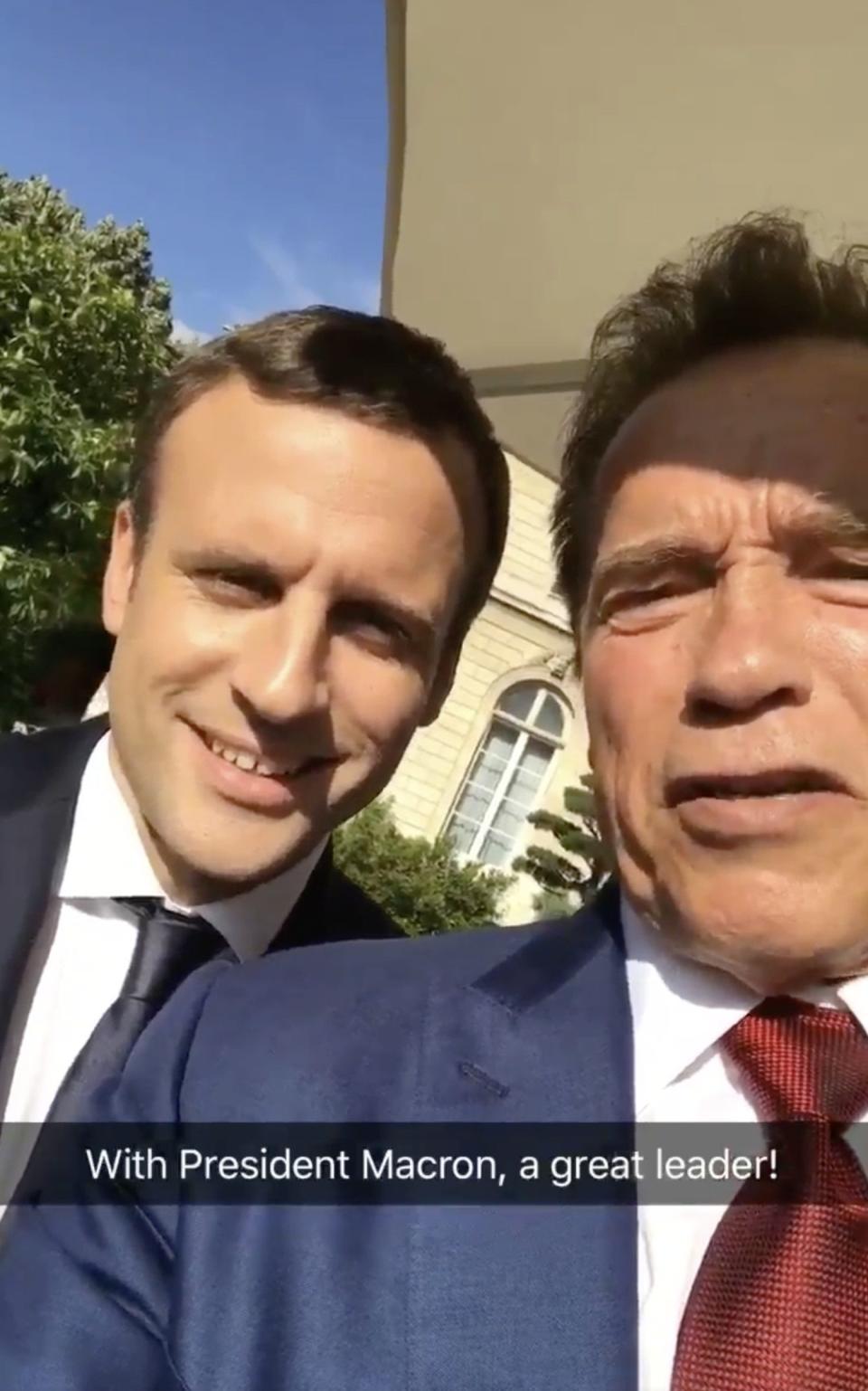 Mr Macron meets Terminator star Mr Schwarzenegger - Credit: Snapchat