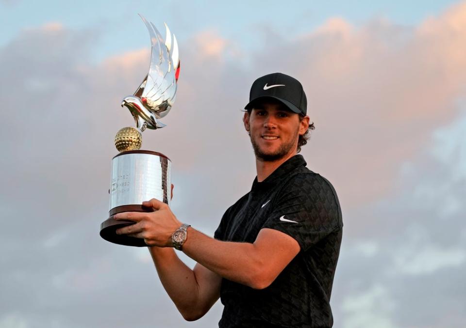 Thomas Pieters celebrates his Abu Dhabi triumph (Kamran Jebreili/AP) (AP)