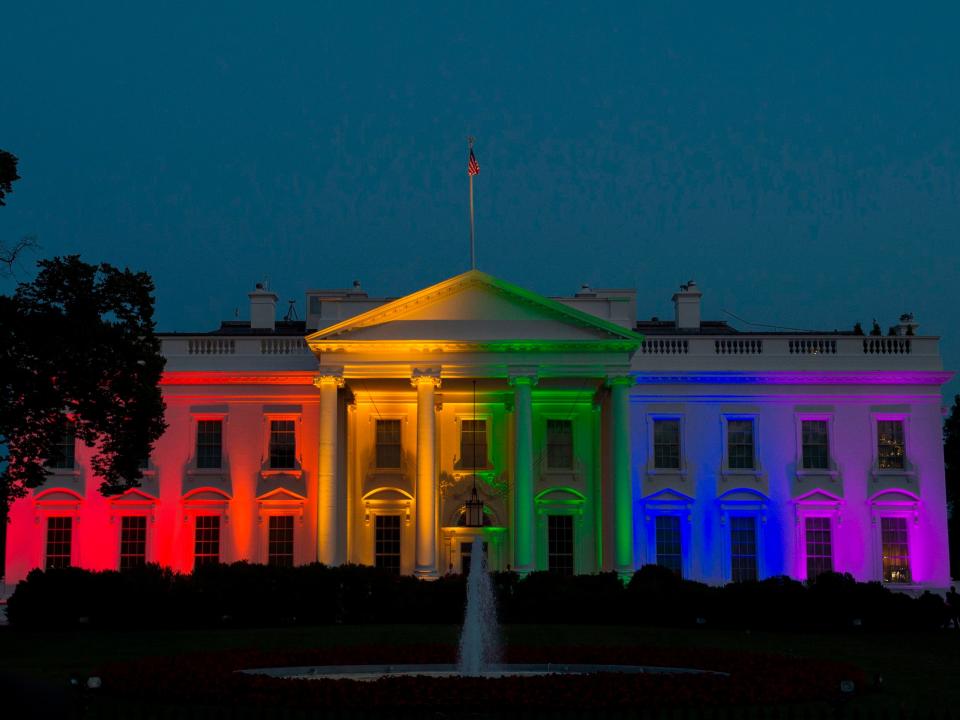 <p>The White House is blanketed in rainbow colours symbolising LGBT+ pride in Washington, DC on 26 June 2015</p> ((AFP via Getty Images))