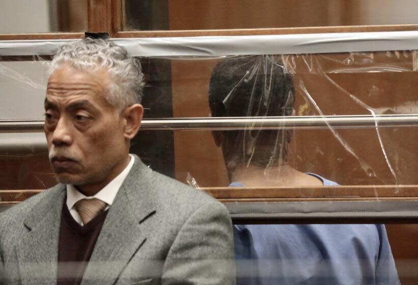 LOS ANGELES CA APRIL 23, 2024 - Ephraim Hunter, right, the suspect in the break-in at Mayor Karen Bass' home, appears in Los Angeles Superior Court for arraignment with Public Defender Carlos Bido, left, late Tuesday afternoon, April 23, 2024. (Al Seib / For The Times)