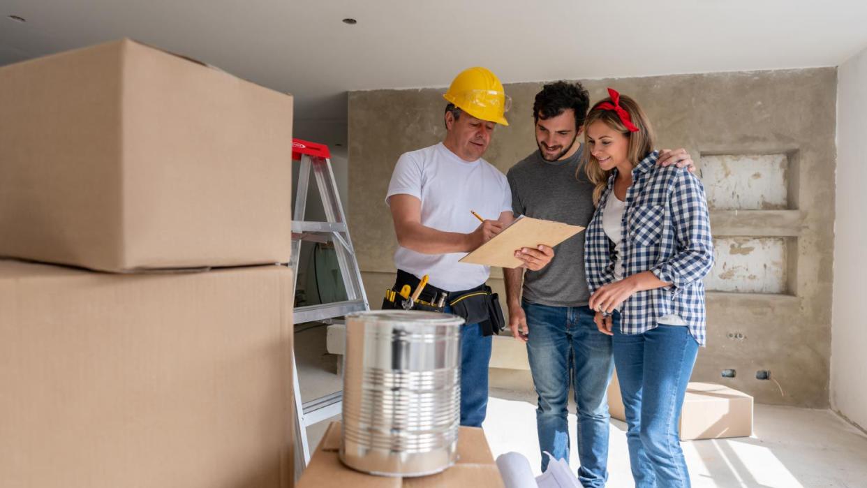 Couple talking to the contractor