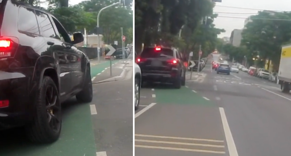 Image of the black Jeep stopped on the bike lane.