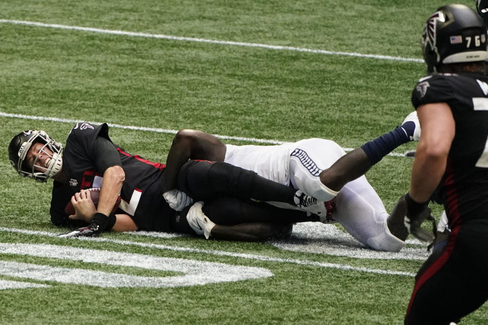 Atlanta Falcons quarterback Matt Ryan (2) is sacked by Seattle Seahawks defense during the second half of an NFL football game, Sunday, Sept. 13, 2020, in Atlanta. (AP Photo/John Bazemore)