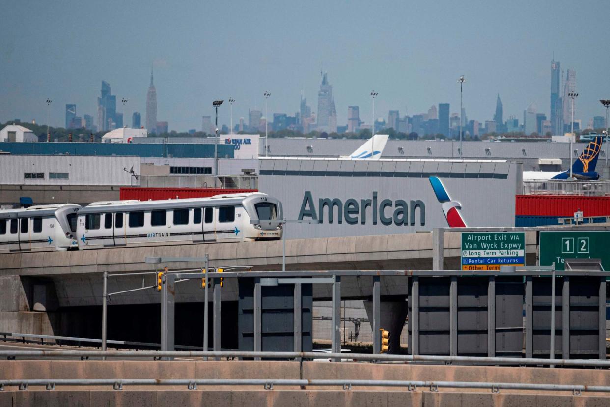 The American Airlines logo is seen at John F. Kennedy Airport: AFP via Getty Images