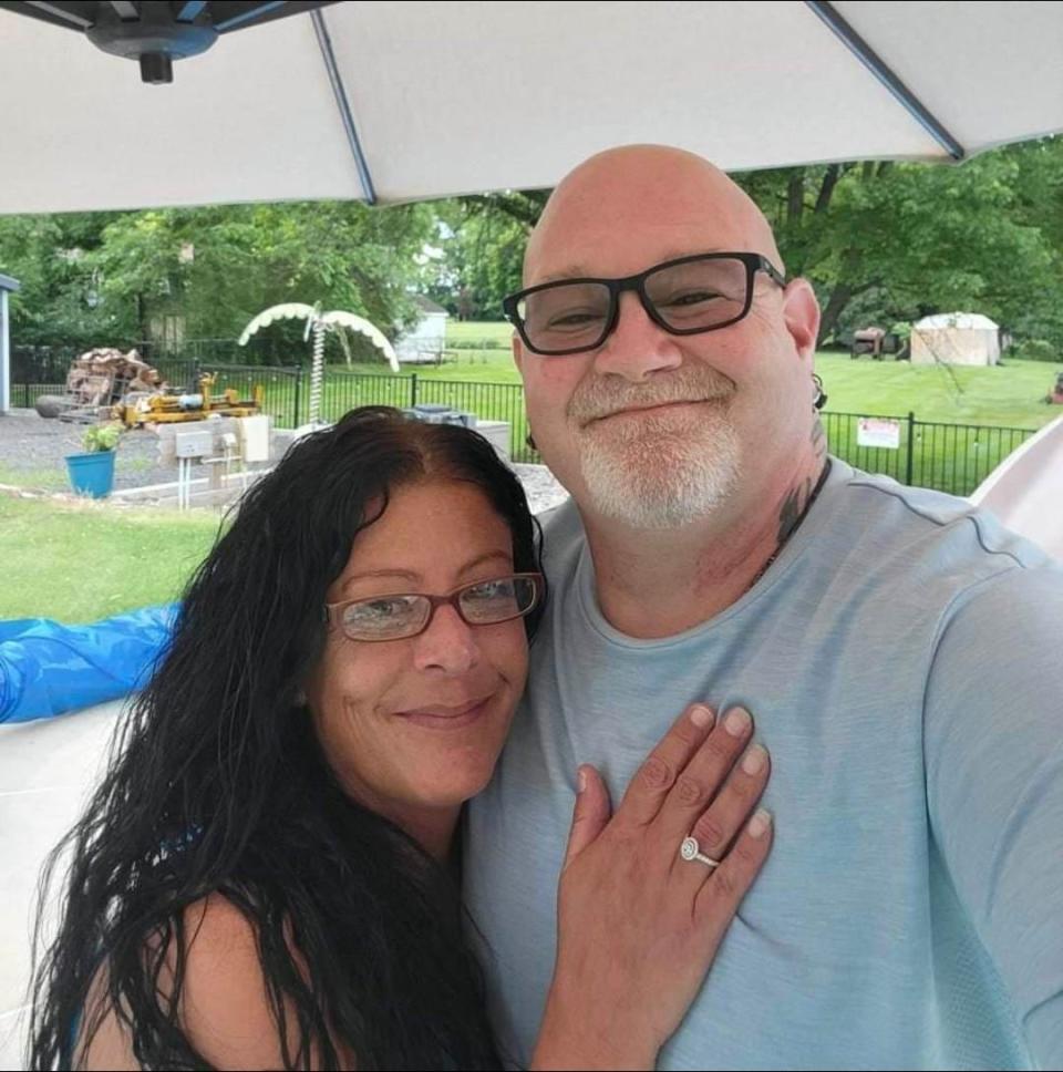 Jason Smith with his fiancée Elise Poore. Smith, of Bristol Township, was killed in a hit-and-run outside a McDonald's in the township last month. Police have not identified who struck him