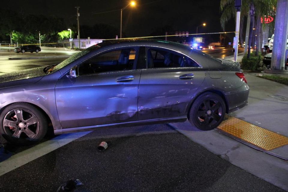 A crime-scene photo of the Mercedes-Benz believed shot at during a police chase in April 2021. What appears to be a bullet hole is in the driver’s side rear door.