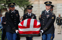 <p>An Honor Guard carries the casket of Senator John McCain out of the Arizona State Capitol to a memorial service in Phoenix, Ariz., Aug. 30, 2018. (Photo: Brian Snyder/Reuters) </p>