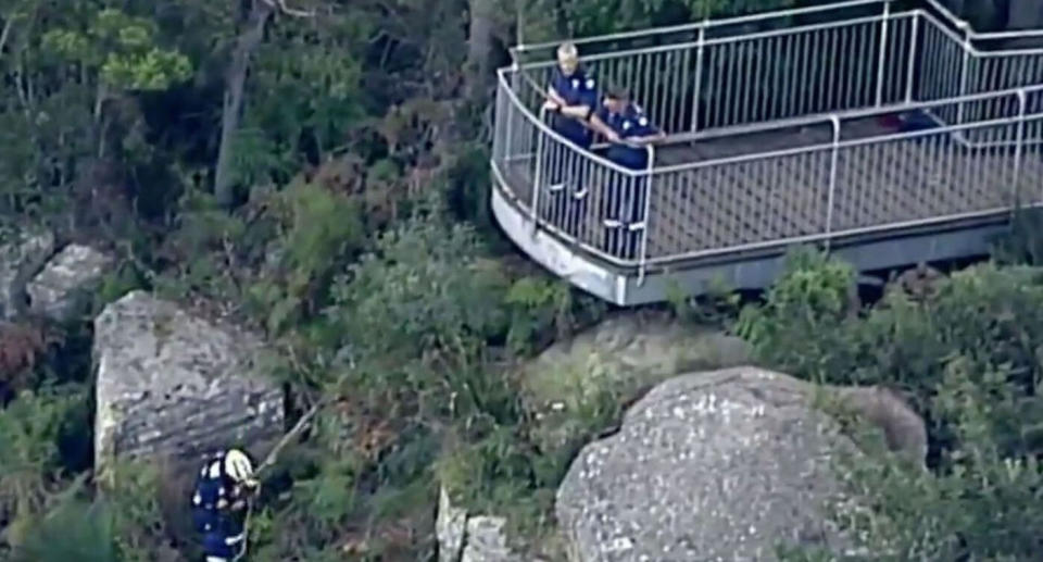 A mother and her two-year-old daughter were found dead at the bottom of the cliff at Robertson Lookout (pictured), in Mount Keira.  Source: Nine News