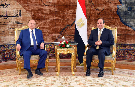 Egypt's President Abdel Fattah al-Sisi (R) meets his Yemeni counterpart Abedrabbo Mansour Hadi at the presidential palace in Cairo, Egypt, August 13, 2018, in this handout picture courtesy of the Egyptian Presidency. The Egyptian Presidency/Handout via REUTERS ATTENTION EDITORS - THIS IMAGE WAS PROVIDED BY A THIRD PARTY