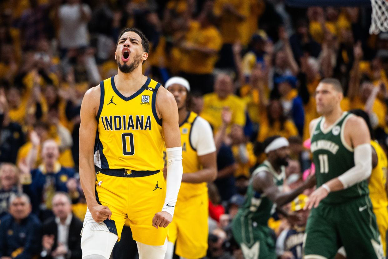 Indiana Pacers guard Tyrese Haliburton celebrates after making a basket against the Milwaukee Bucks during Game 3 of their first-round playoff series. The Pacers edged the Bucks 121-118 in overtime.