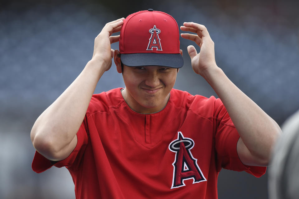SAN DIEGO, CA - AUGUST 14: Shohei Othani #17 of the Los Angeles Angels of Anaheim adjusts his cap prior to the game against the San Diego Padres at PETCO Park on August 14, 2018 in San Diego, California. (Photo by Andy Hayt/San Diego Padres/Getty Images)