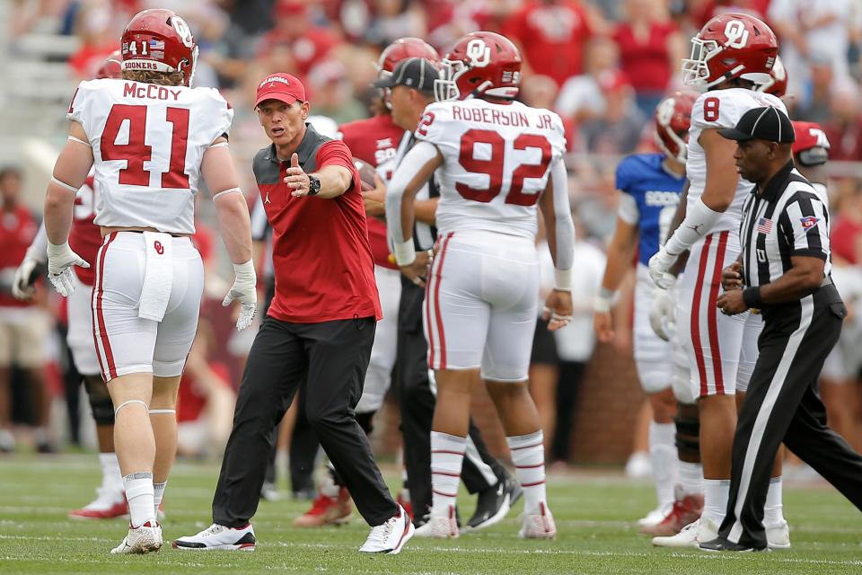 OU coach Brent Venables instructs Sooners Jake McCoy (41) and Kori Roberson (92) during the Sooner spring game in April. BRYAN TERRY/The Oklahoman