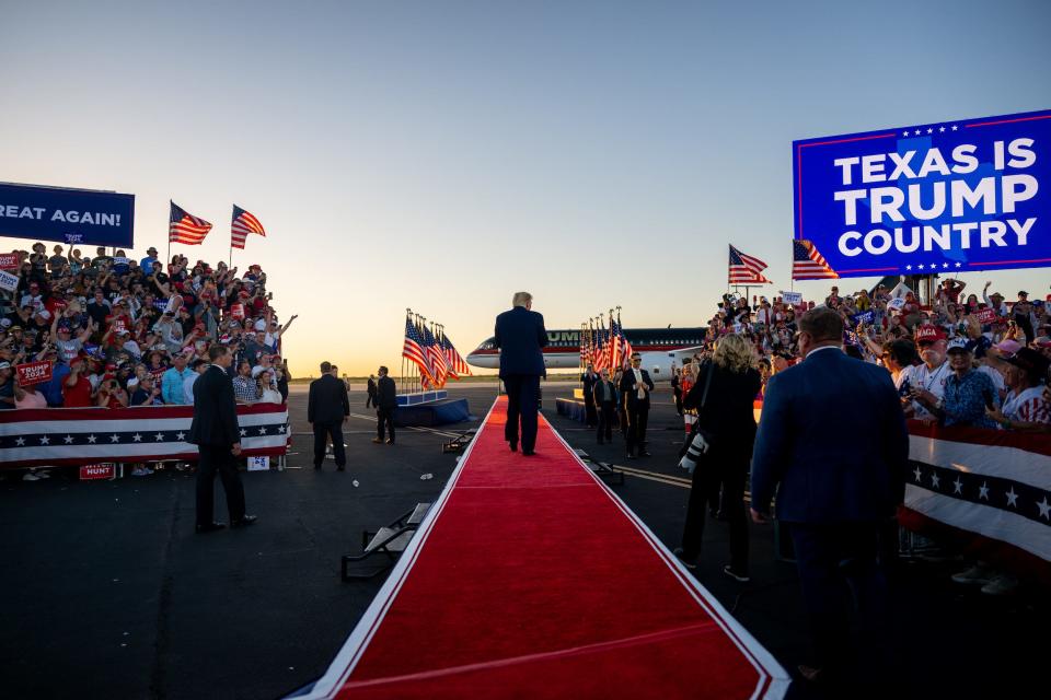 Donald Trump exits after a campaign rally