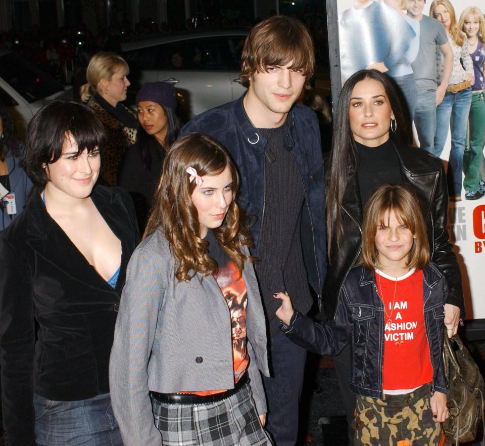 Rumer Willis, Scout Willis and Tallulah Willis pose with Demi Moore and Ashton Kutcher at the premiere of "Cheaper by the Dozen"