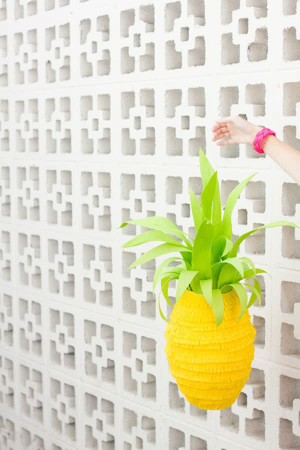 <p>A treat-filled lantern can do double-duty as party decor and favors, but it'll be hard to smash this too-cute pineapple piñata.</p><p><em><a href="http://www.studiodiy.com/2013/09/03/diy-pineapple-pinata/" rel="nofollow noopener" target="_blank" data-ylk="slk:Get the tutorial at Studio DIY »;elm:context_link;itc:0;sec:content-canvas" class="link ">Get the tutorial at Studio DIY »</a></em> </p>
