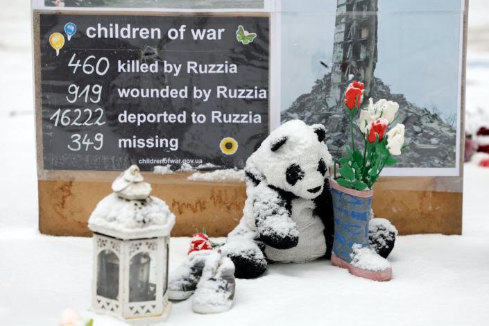 A makeshift memorial dedicated to children killed, wounded, deported or missing in Ukraine is seen outside the Russian Embassy in Berlin in February 2023. <a href="https://media.gettyimages.com/id/1246840542/photo/germany-russia-ukraine-children.jpg?s=1024x1024&w=gi&k=20&c=eBfWpINrZ1teJKRXmJyVycWSAE5ac0iYwTTlNzH0Cqs=" rel="nofollow noopener" target="_blank" data-ylk="slk:Odd Andersen/AFP via Getty Images;elm:context_link;itc:0" class="link ">Odd Andersen/AFP via Getty Images</a>