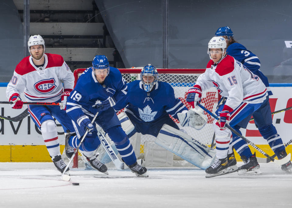 TORONTO, ON - JANUARY 13: Frederik Andersen #31 of the Toronto Maple Leafs guards the net with teammate Jason Spezza #19 against Jesperi Kotkaniemi #15 and Joel Armia #40 of the Montreal Canadiens during the third period at the Scotiabank Arena on January 13, 2021 in Toronto, Ontario, Canada. (Photo by Mark Blinch/NHLI via Getty Images)