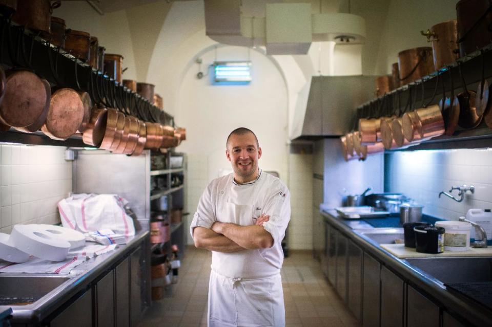 Guillaume Gomez, the new head chef at the Elysee Palace, poses for photographers in the kitchens at the Elysee Palace in Paris, France, Thursday, Oct. 31, 2013. Guillaume Gomez replaces France’s presidential chef, Bernard Vaussion, 60, who retired after four decades of culinary service. (AP Photo/Martin Bureau, pool)