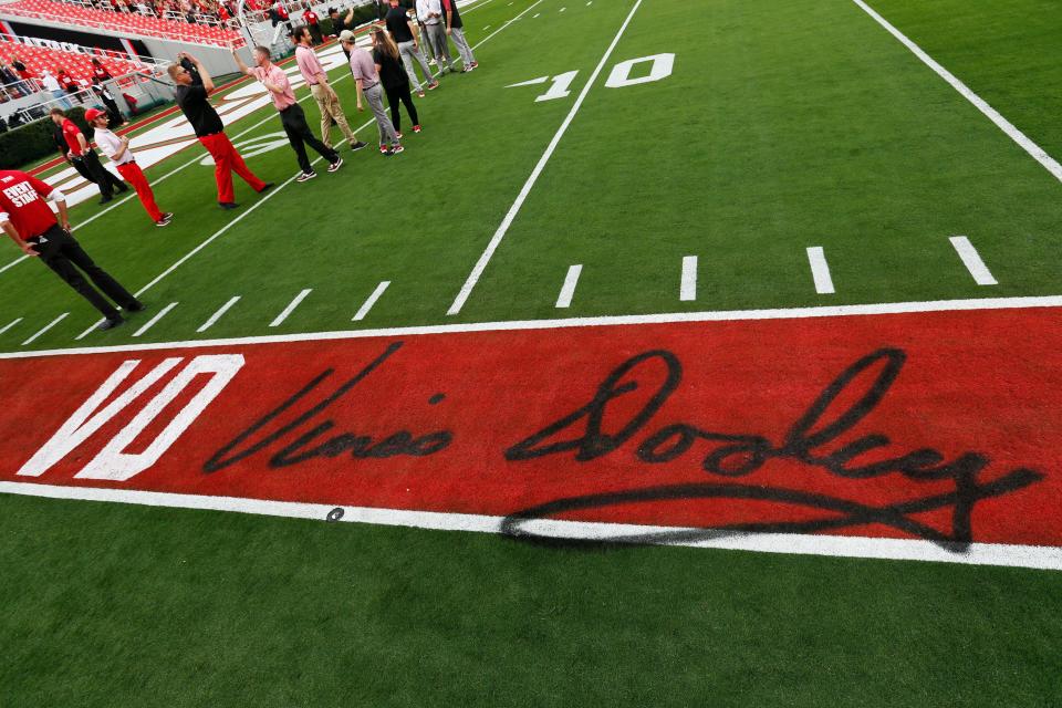 Georgia legendary coach Vince Dooley who recently passed away is honored with his name on the field before the start of a NCAA college football game between Tennessee and Georgia in Athens, Ga., on Saturday, Nov. 5, 2022.