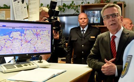 German Interior Minister Thomas de Maiziere is seen during his visit at the federal police inspection in Bremen, Germany, August 10, 2016.REUTERS/Fabian Bimmer