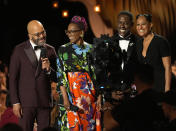 Jeffrey Wright, from left, Erika Alexander, Sterling K. Brown, and Tracee Ellis Ross present a segment from "American Fiction" during the 30th annual Screen Actors Guild Awards on Saturday, Feb. 24, 2024, at the Shrine Auditorium in Los Angeles. (AP Photo/Chris Pizzello)