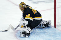 Boston Bruins goaltender Tuukka Rask (40) makes a save against the Pittsburgh Penguins during the second period of an NHL hockey game, Tuesday, Jan. 26, 2021, in Boston. (AP Photo/Charles Krupa)