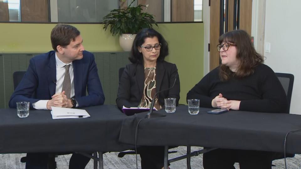 B.C. Premier David Eby listens to Anna Phelan, a Victoria parent who has $10 per day childcare, at a budget roundtable event on March 4, 2024, while Debbie Banjaree, executive director of Fairfield Gonzales Community Association, listens. 