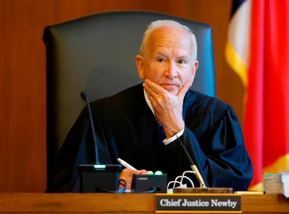 Chief Justice Paul Newby listens during oral arguments at the Supreme Court of North Carolina in Raleigh in 2022.