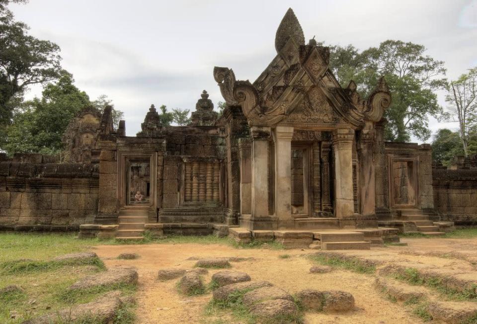 Banteay Srei, constructed mostly out of red sandstone, is one of the most elaborately decorated temples.