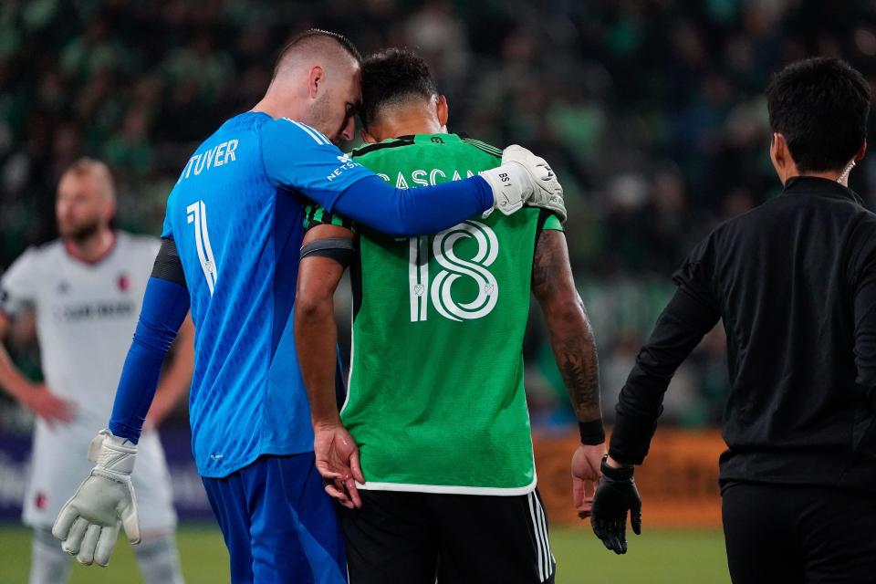 Austin FC goalkeeper Brad Stuver talks with defender Julio Cascante during the season-opening match against St. Louis City SC. Austin FC is 2-3-1 and looking to right itself. "This week has been a little bit testy," Stuver said ahead of Saturday's match with Vancouver at Q2 Stadium.