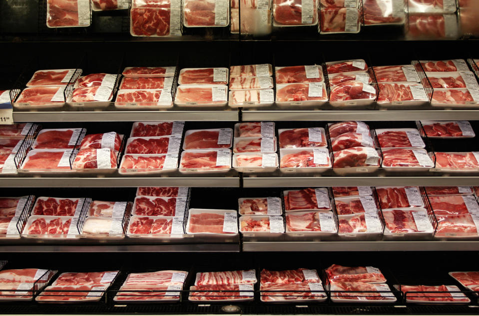 A meat department at a grocery store, showcasing red meat packages for sale on shelves. (Photo via Getty Images)