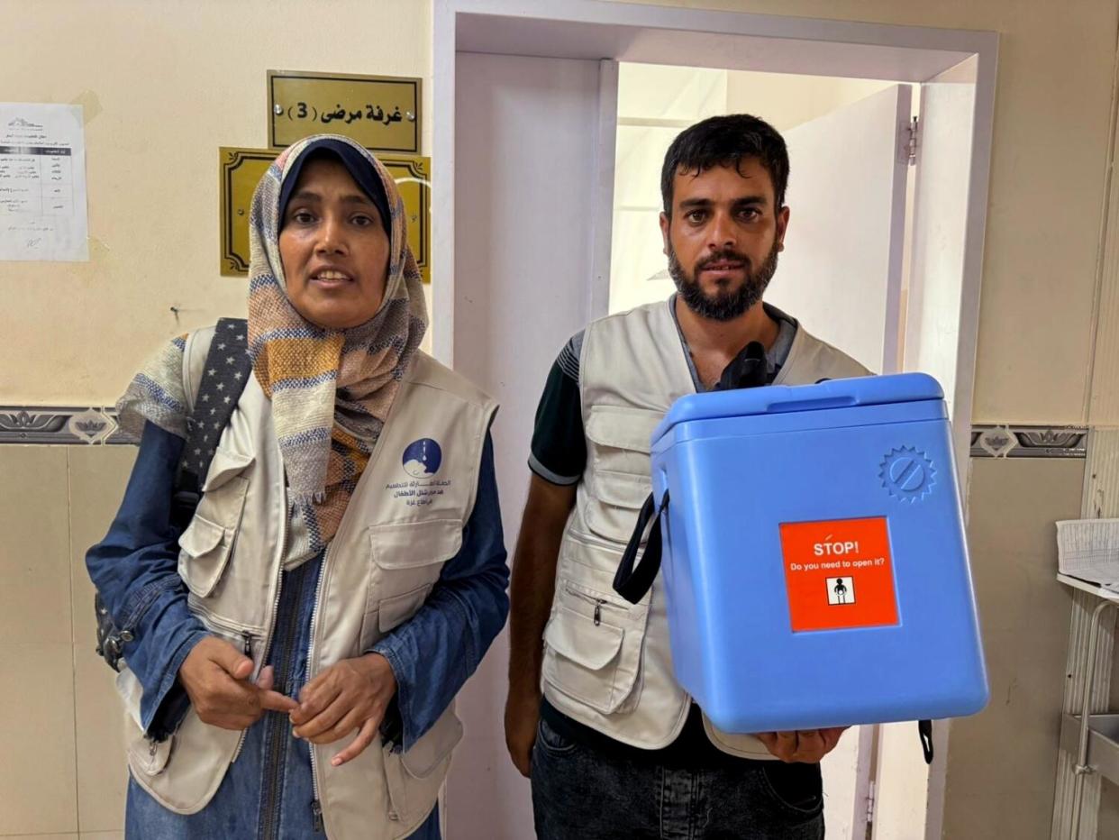 Nurses aiding in the vaccination efforts in central Gaza, preparing to travel to a vaccine site.