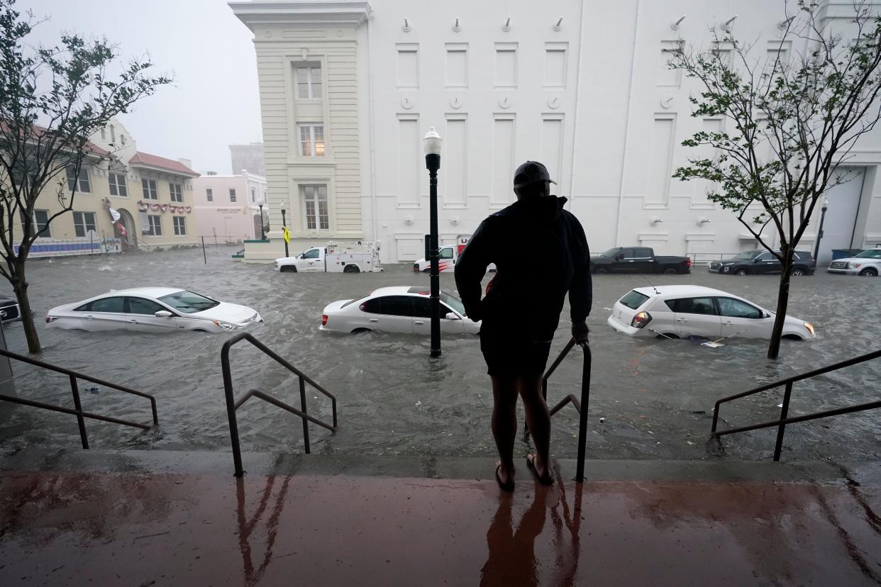 Flood waters move up a street in downtown Pensacola, Florida after Hurricane Sally made landfall on Wednesday  (AP)