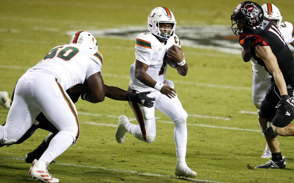 Miami quarterback D'Eriq King (1) accounted for six TDs against North Carolina State. (Ethan Hyman/The News & Observer via AP, Pool)