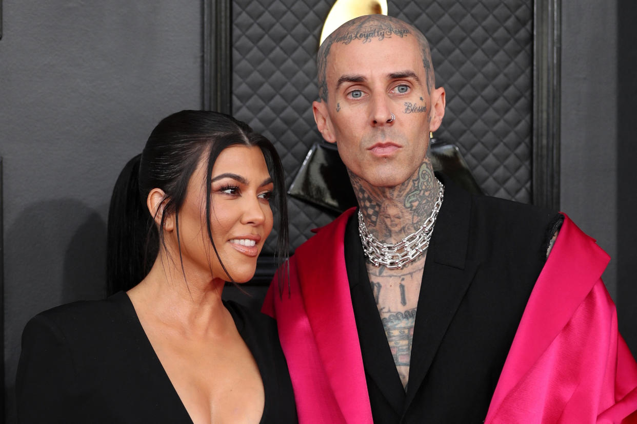 Kourtney Kardashian (pictured with Travis Barker on April 3) is calling out the paparazzi amid her husband's health scare. (Photo: REUTERS/Maria Alejandra Cardona