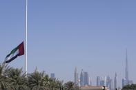 UAE national flag flies at half-staff after the announcement of the Emirates president's death, in Dubai, United Arab Emirates, Friday, May 13, 2022. Sheikh Khalifa died Friday, May 13, 2022, the government's state-run news agency announced in a brief statement. He was 73. (AP Photo/Kamran Jebreili)