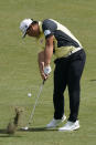 Sungjae Im, of South Korea, hits to the ninth hole during the third round of the Wyndham Championship golf tournament in Greensboro, N.C., Saturday, Aug. 6, 2022. (AP Photo/Chuck Burton)