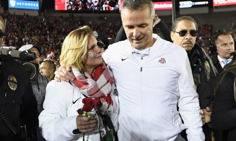 urban meyer and his wife shelley meyer after the rose bowl