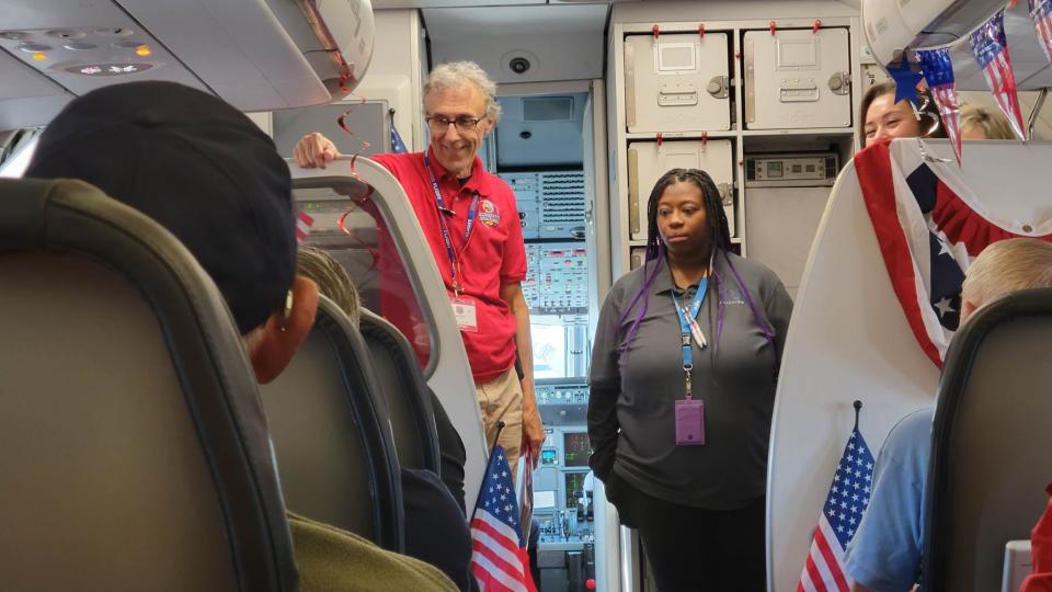 Blue Ridge Honor Flight founder Jeff Miller of Hendersonville talks prior to the takeoff of the flight on April 29 at the Asheville Regional Airport.