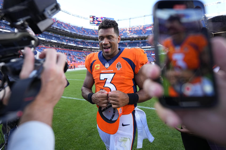 Denver Broncos quarterback Russell Wilson (3) leaves the field after an NFL football game, against the Houston Texans, Sunday, Sept. 18, 2022, in Denver. The Broncos defeated the Texans 16-9. (AP Photo/Jack Dempsey)