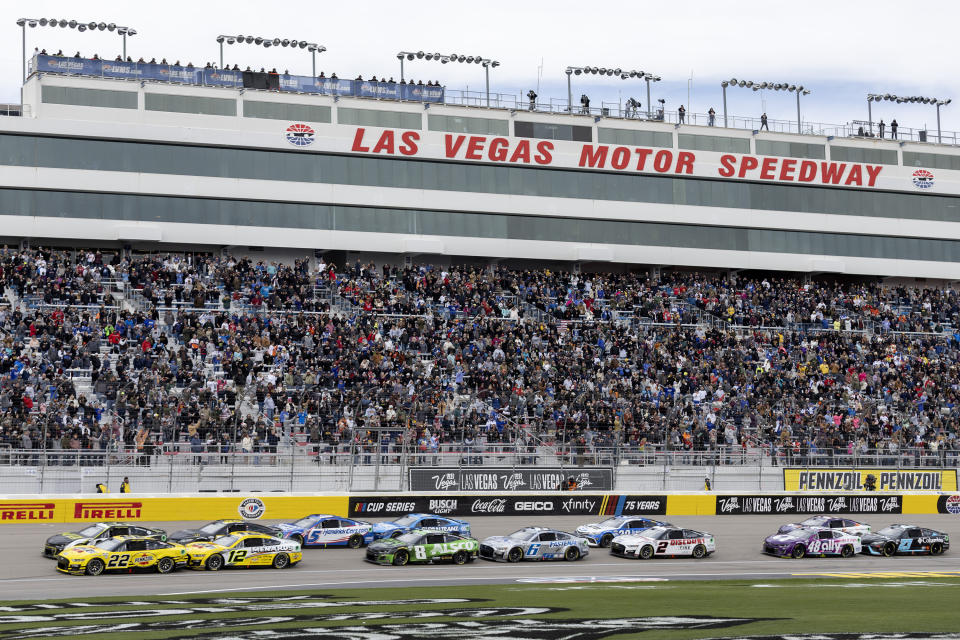 Drivers take to the track for their first lap during a NASCAR Cup Series auto race Sunday, March 5, 2023, in Las Vegas. (AP Photo/Ellen Schmidt)