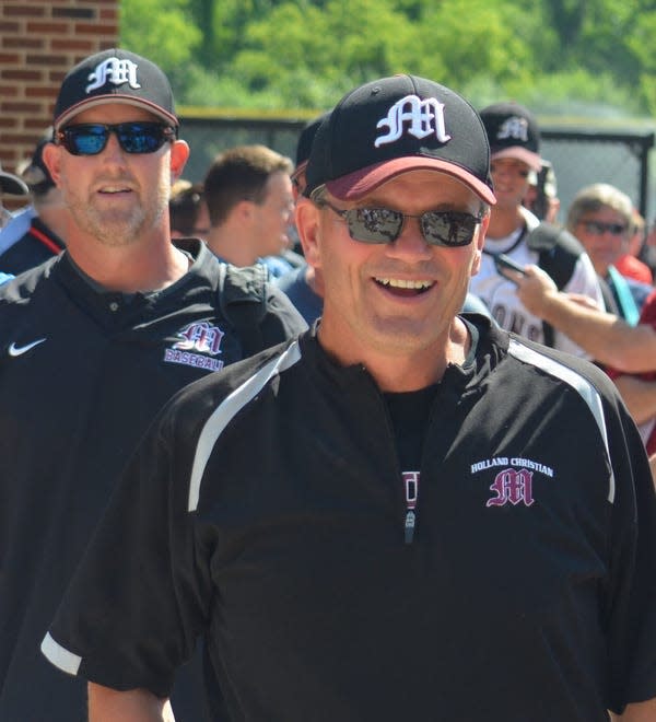 Holland Christian baseball coach Jim Caserta reacts after the Maroons won the state title in 2016.