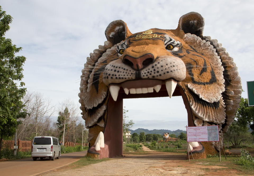 A vehicle enters the "Tiger Temple" in Saiyok district, Kanchanaburi province, west of Bangkok, Thailand. Source: AP Photo/Mark Baker