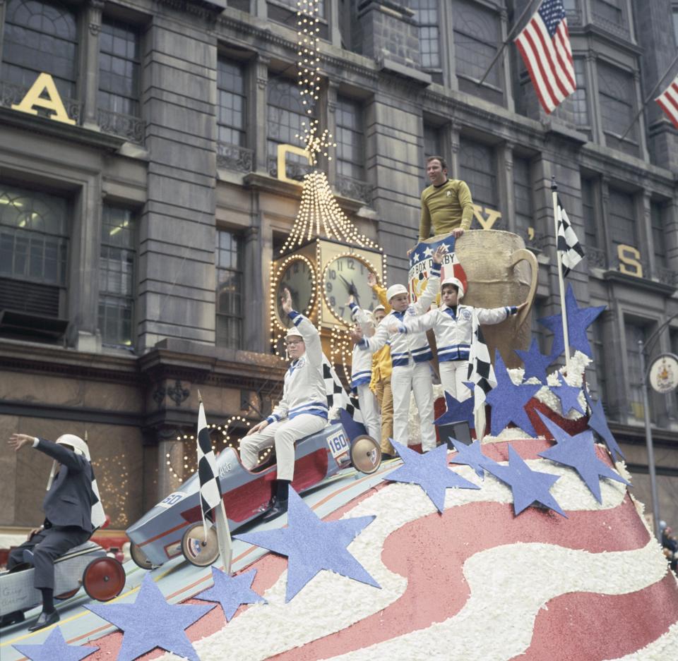 "Star Trek" star William Shatner with soapbox derby members on a float