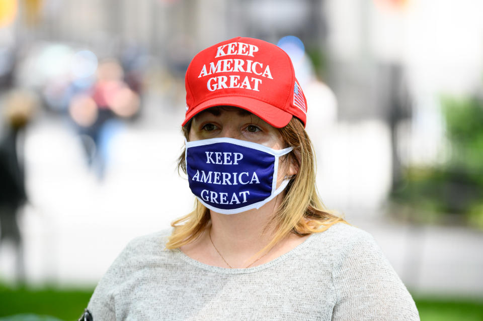 A person wears a "Keep America Great" protective face mask during the coronavirus pandemic on May 24, 2020 in New York City. (Photo by Noam Galai/Getty Images)