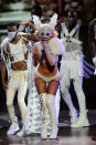 <p>Lady Gaga mixed it up with a breath-taking performance of "Paparazzi" onstage at the 2009 MTV VMAs. What better way to make a statement than a white lace rabbit mask, cape and knee-high, jewelled white pleather boots?</p>