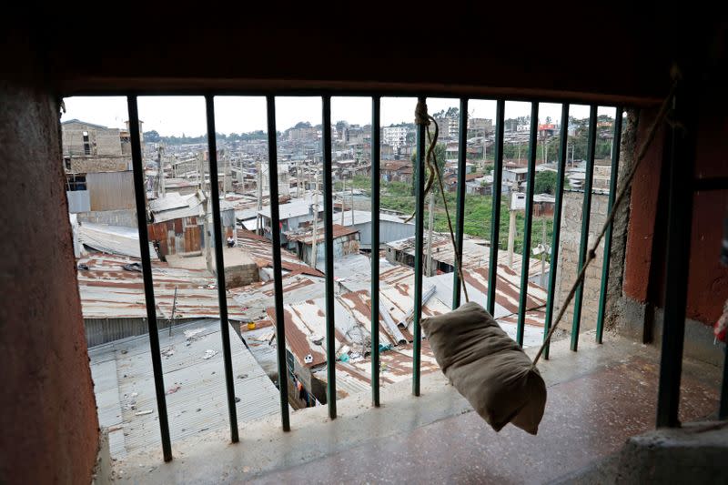 A view is seen from the window of a staircase inside a building in the Mathare slums of Nairobi