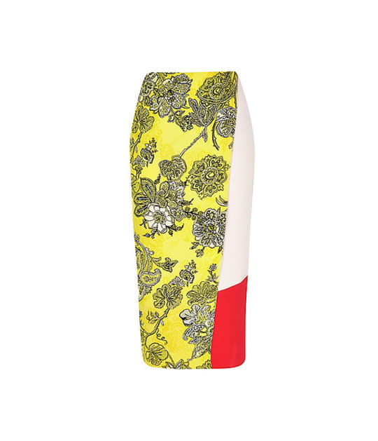 Pair a vibrant floral color-blocked midi skirt with any solid basics and you’ll feel instantly refreshed. 