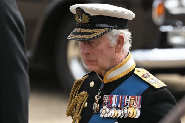 King Charles III follows the coffin of Queen Elizabeth II as it travels on the State Gun Carriage of the Royal Navy, from Westminster Abbey to Wellington Arch in London on Sept. 19, 2022, after the state funeral service.<p><a href="https://www.gettyimages.com/detail/1243357838" rel="nofollow noopener" target="_blank" data-ylk="slk:LOIC VENANCE/Getty Images;elm:context_link;itc:0;sec:content-canvas" class="link ">LOIC VENANCE/Getty Images</a></p>